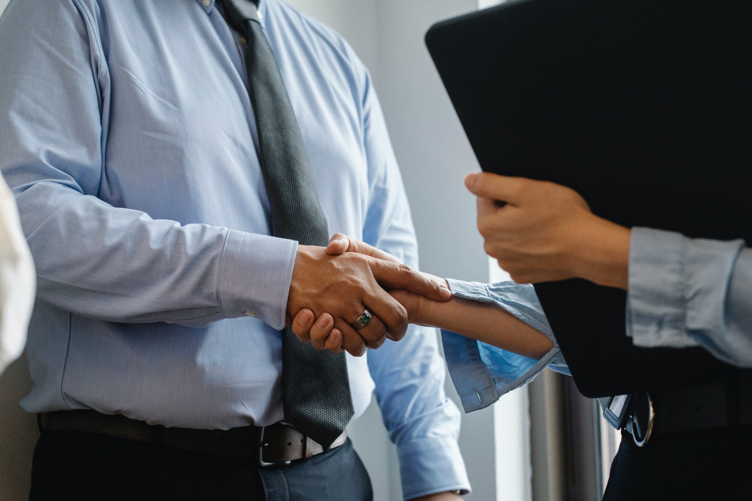 Man & woman shaking hands